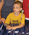 Boy reading Braille
